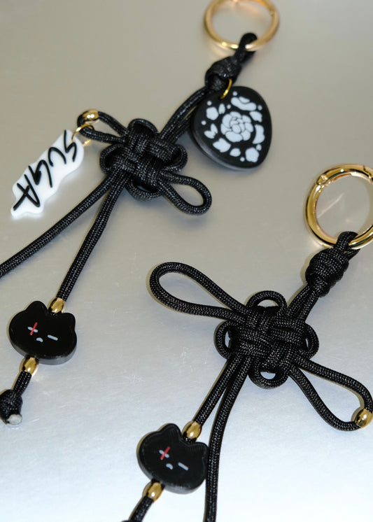 Suga Lucky Knot Keychain With Charms