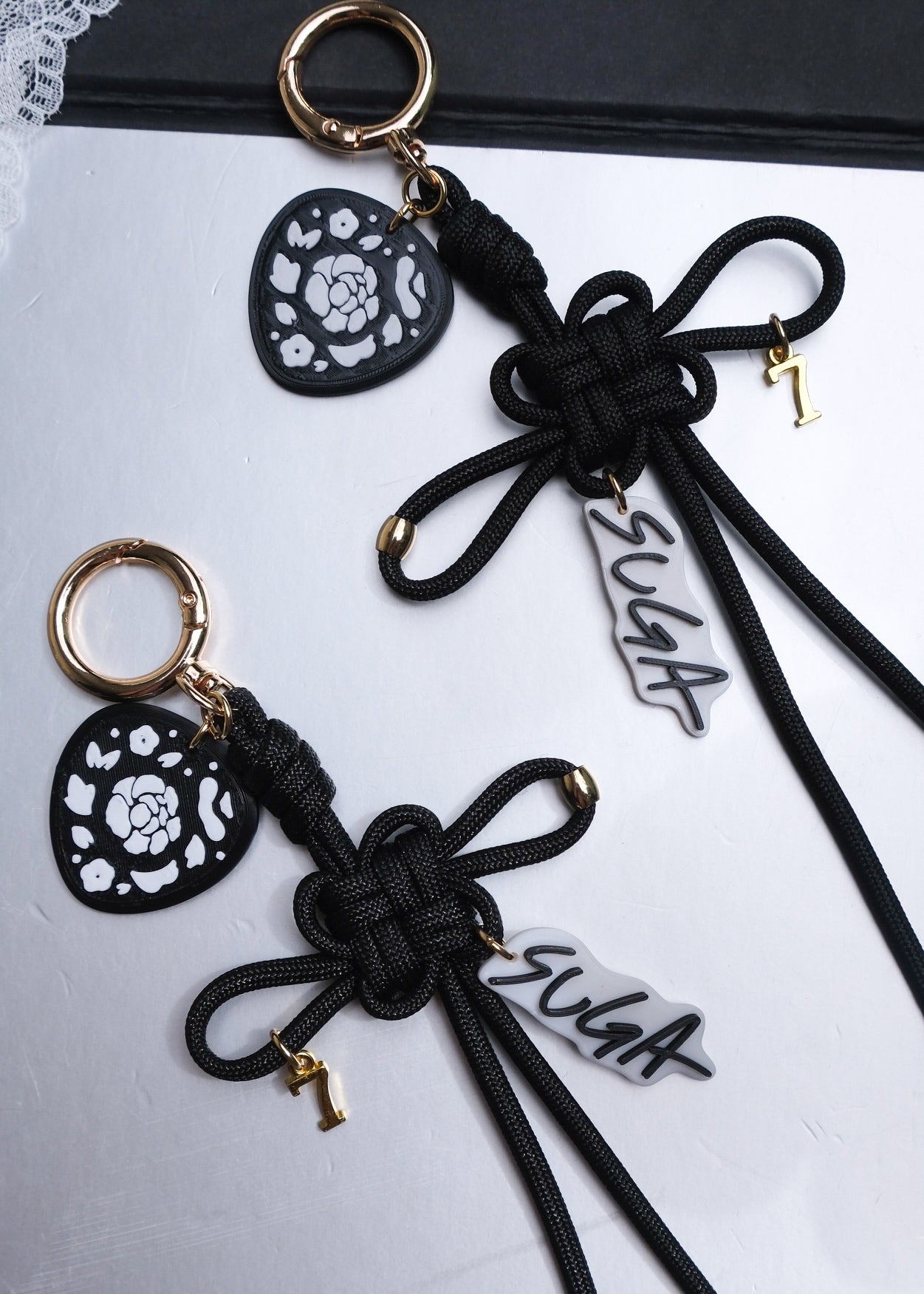 Suga Lucky Knot Keychain With Charms