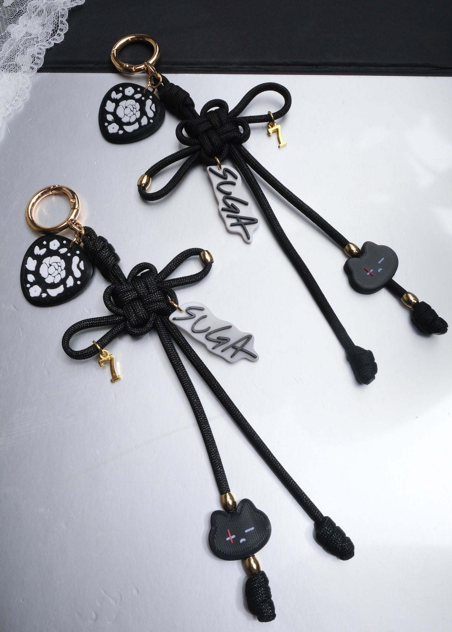 Suga Lucky Knot Keychain With Charms