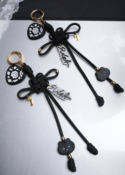 Suga Lucky Knot Keychain With Charms