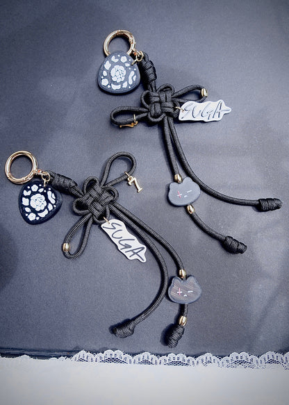 Suga Lucky Knot Keychain With Charms