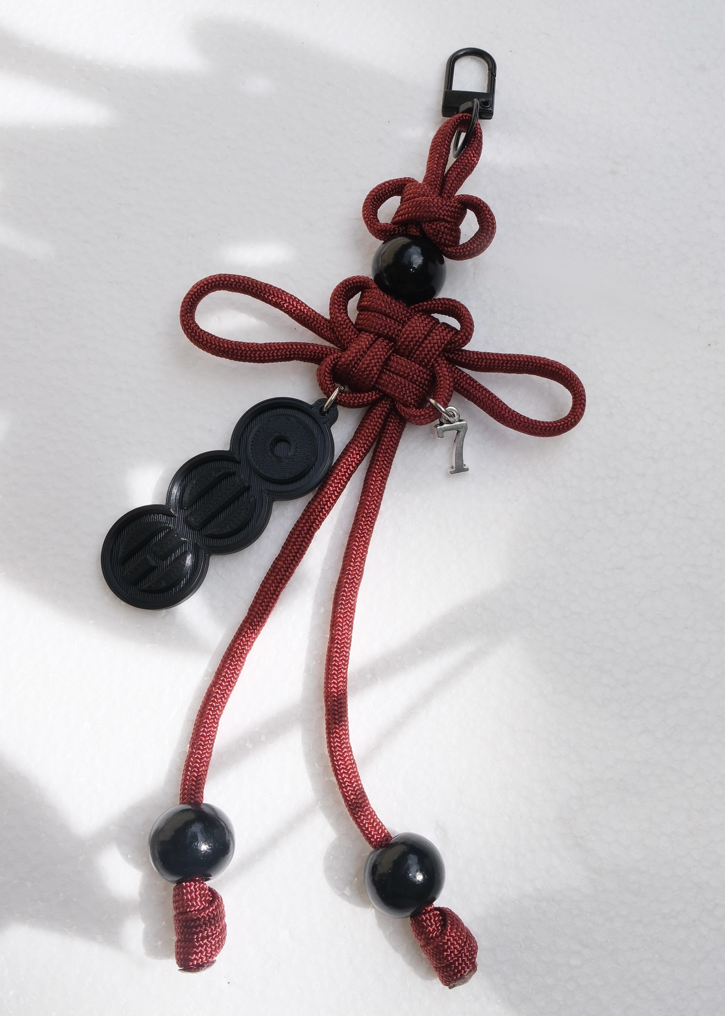 What is your love song ? Lucky Knot Keyring | Garnet