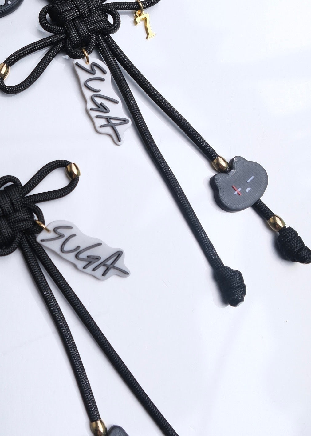 Suga Lucky Knot Keychain With Charms